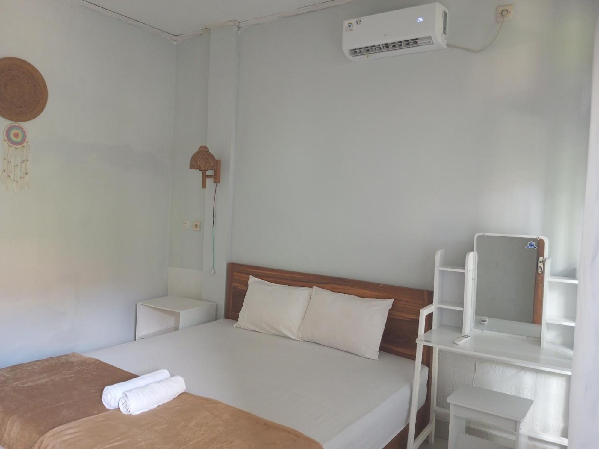 Kri Homestay Kuta  部屋 写真