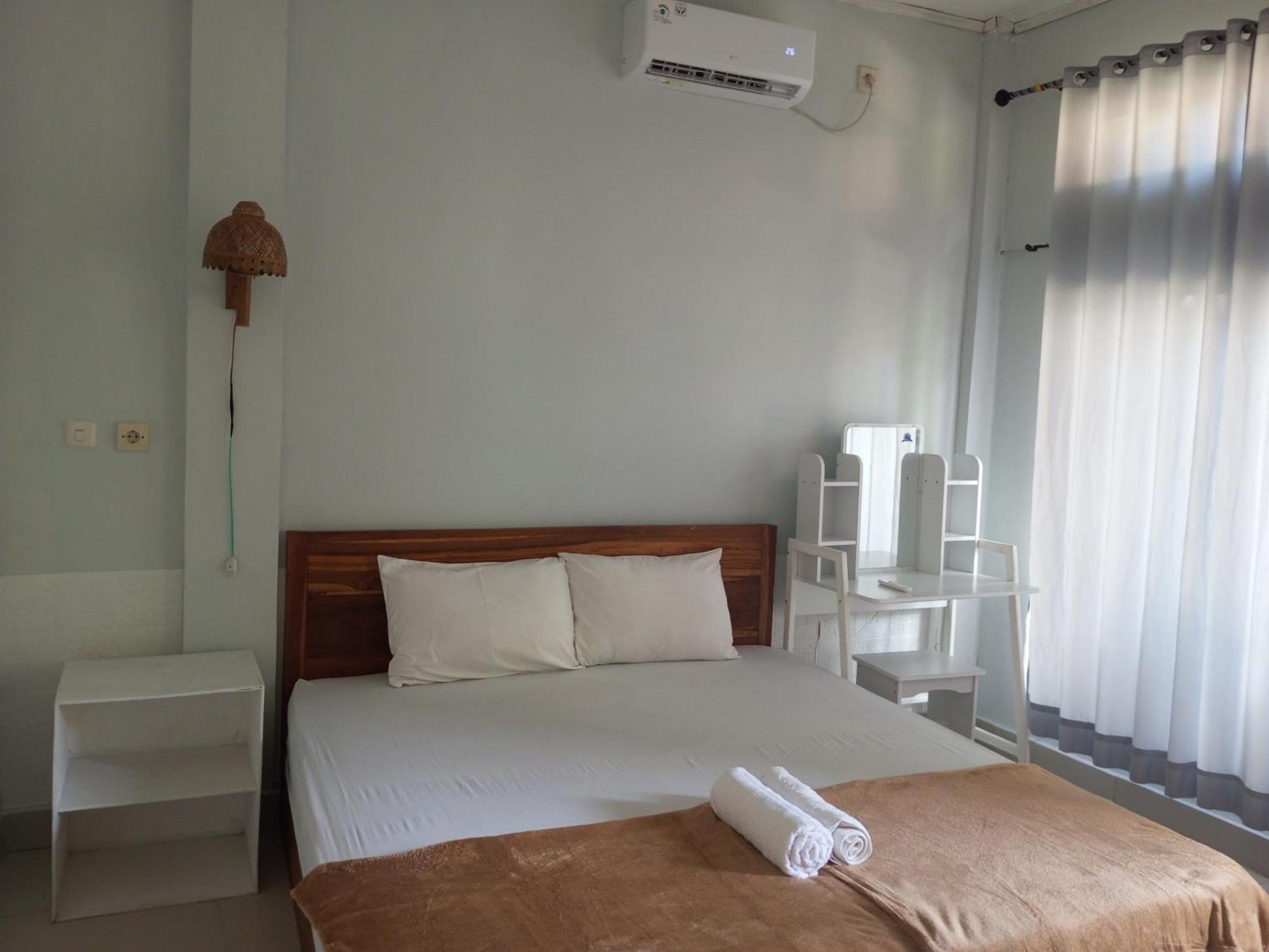 Kri Homestay Kuta  部屋 写真